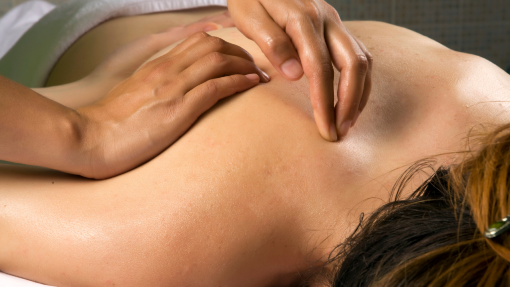 image of a woman receiving a massage