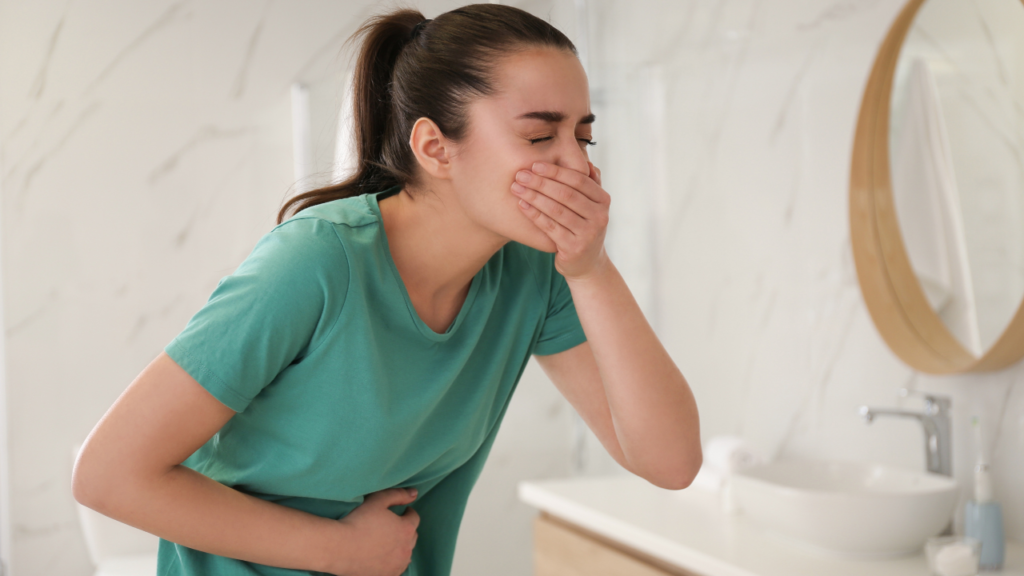 image of a woman feeling sick or nauseated after a massage 