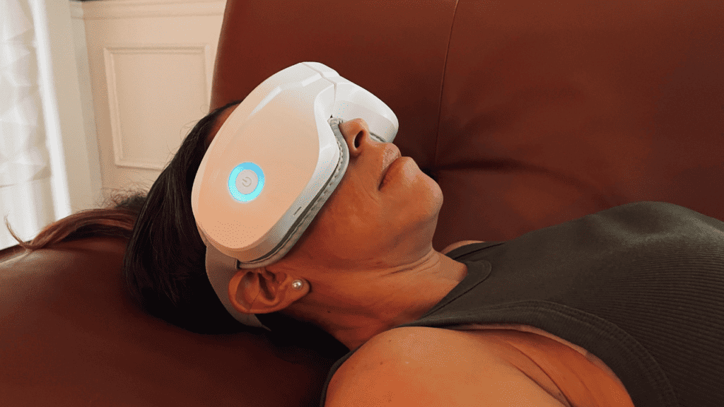 woman wearing the ireliev relaxable eye massager 