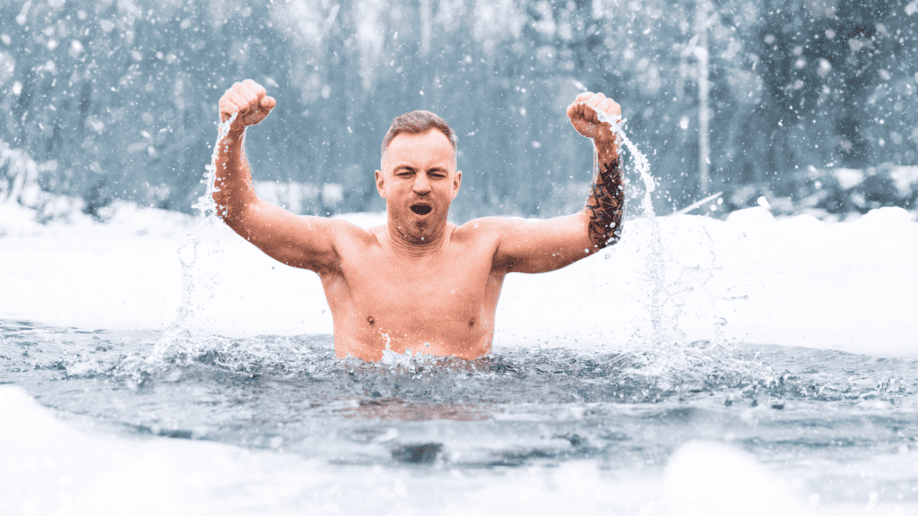 image of a man taking a cold plunge in icy cold water, cold shower vs ice bath